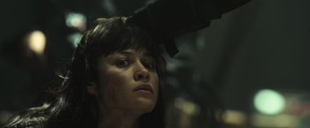 Movie still from “Oblivion” (2013), directed by Joseph Kosinski – A person getting her hair dried; Close Up shot, Low angle