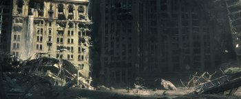 Movie still from “Oblivion” (2013), directed by Joseph Kosinski – A building that has been destroyed in the middle of the day; Extreme Wide shot, High angle