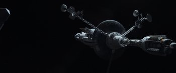 Movie still from “Oblivion” (2013), directed by Joseph Kosinski – An image of a space ship in the night sky; Extreme Wide shot, Overhead angle