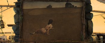 Movie still from “Oblivion” (2013), directed by Joseph Kosinski – A painting of a woman sitting in a field; Wide shot, Low angle