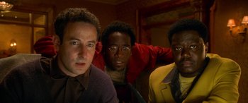 Movie still from “Ocean's Eleven” (2001), directed by Steven Soderbergh – A group of men standing next to each other in a room; Close Up shot, Low angle