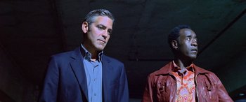 Movie still from “Ocean's Thirteen” (2007), directed by Steven Soderbergh – A man and a woman standing next to each other in a room; Close Up shot, Low angle