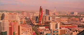 Movie still from “Ocean's Thirteen” (2007), directed by Steven Soderbergh – An aerial view of a large city with many tall buildings; Extreme Wide shot, High angle