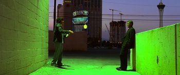 Movie still from “Ocean's Thirteen” (2007), directed by Steven Soderbergh – Two men are playing with a ball in the street; Wide shot, Over the shoulder angle