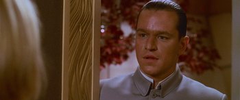 Movie still from “Ocean's Thirteen” (2007), directed by Steven Soderbergh – A person wearing a suit and tie; Close Up shot, Low angle