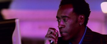 Movie still from “Ocean's Thirteen” (2007), directed by Steven Soderbergh – A person talking on a cell phone; Close Up shot, Low angle