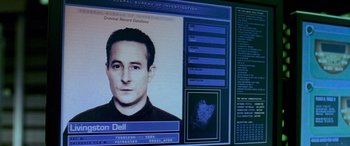 Movie still from “Ocean's Thirteen” (2007), directed by Steven Soderbergh – A computer screen showing a man's photo and a fingerprint; Extreme Close Up shot, Low angle