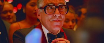 Movie still from “Ocean's Thirteen” (2007), directed by Steven Soderbergh – An older man wearing glasses and a bow tie; Close Up shot, Low angle
