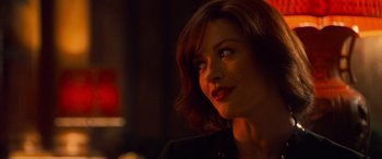 Movie still from “Ocean's Twelve” (2004), directed by Steven Soderbergh – A person looking up at something; Close Up shot, Over the shoulder angle