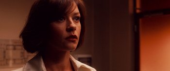 Movie still from “Ocean's Twelve” (2004), directed by Steven Soderbergh – A person wearing a white shirt; Close Up shot, Low angle