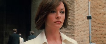 Movie still from “Ocean's Twelve” (2004), directed by Steven Soderbergh – A person with short hair; Close Up shot, Low angle