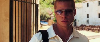 Movie still from “Ocean's Twelve” (2004), directed by Steven Soderbergh – A person wearing glasses and a white shirt; Close Up shot, Low angle