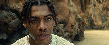 Movie still from “Old” (2021), directed by M. Night Shyamalan – A person with a nose ring; Close Up shot, Low angle