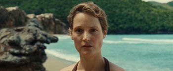 Movie still from “Old” (2021), directed by M. Night Shyamalan – A person on a beach; Close Up shot, Over the shoulder angle