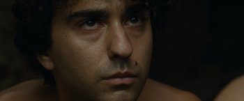 Movie still from “Old” (2021), directed by M. Night Shyamalan – A person's eyes and face; Close Up shot, High angle