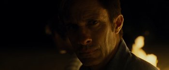 Movie still from “Old” (2021), directed by M. Night Shyamalan – A person looking at the camera; Close Up shot, Over the shoulder angle