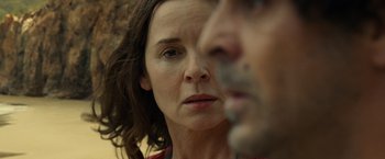 Movie still from “Old” (2021), directed by M. Night Shyamalan – A woman's face and a man's face; Close Up shot, Over the shoulder angle