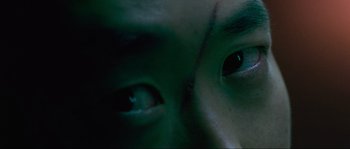 Movie still from “Oldboy” (2003), directed by Park Chan-wook – View of a person's eyes in the dark; Extreme Close Up shot, Overhead angle
