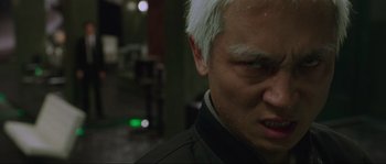 Movie still from “Oldboy” (2003), directed by Park Chan-wook – A person with white hair; Close Up shot, Low angle