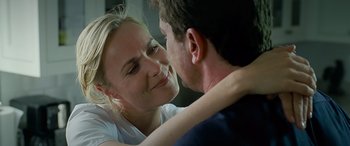 Movie still from “Olympus Has Fallen” (2013), directed by Antoine Fuqua – A man and a woman are looking into each others eyes; Close Up shot, Over the shoulder angle