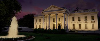 Movie still from “Olympus Has Fallen” (2013), directed by Antoine Fuqua – A large white building lit up at night; Extreme Wide shot, Low angle