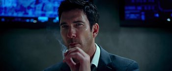 Movie still from “Olympus Has Fallen” (2013), directed by Antoine Fuqua – A person holding a cigarette in his mouth; Close Up shot, Low angle