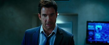 Movie still from “Olympus Has Fallen” (2013), directed by Antoine Fuqua – A man in a suit and a tie; Close Up shot, Over the shoulder angle