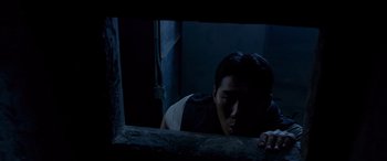 Movie still from “Olympus Has Fallen” (2013), directed by Antoine Fuqua – A man looking at his reflection in a mirror; Medium shot, Overhead angle