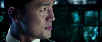 Movie still from “Olympus Has Fallen” (2013), directed by Antoine Fuqua – A man's face with a red spot on it's eye; Close Up shot, Low angle