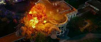Movie still from “Olympus Has Fallen” (2013), directed by Antoine Fuqua – An aerial view of a building being destroyed by a fire; Extreme Wide shot, High angle