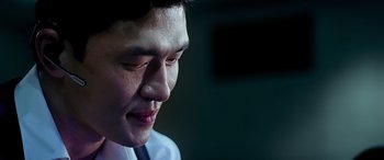 Movie still from “Olympus Has Fallen” (2013), directed by Antoine Fuqua – A person wearing a white shirt; Extreme Close Up shot, Low angle