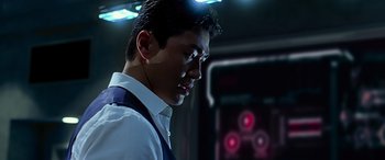 Movie still from “Olympus Has Fallen” (2013), directed by Antoine Fuqua – A man in a white dress shirt and tie; Close Up shot, Low angle