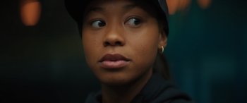 Movie still from “On the Come Up” (2022), directed by Sanaa Lathan – A person wearing a hat; Close Up shot, Low angle