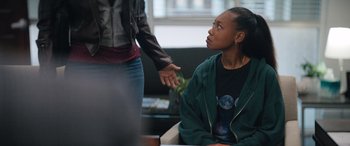Movie still from “On the Come Up” (2022), directed by Sanaa Lathan – A woman holding her hand out to another woman; Medium shot, Over the shoulder angle