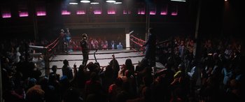 Movie still from “On the Come Up” (2022), directed by Sanaa Lathan – A crowd of people in a boxing ring watching an event; Extreme Wide shot, High angle