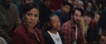 Movie still from “On the Come Up” (2022), directed by Sanaa Lathan – A group of young people sitting in a room together; Close Up shot, Over the shoulder angle