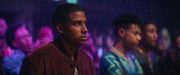 Movie still from “On the Come Up” (2022), directed by Sanaa Lathan – Two young men are standing in a room; Close Up shot, Over the shoulder angle