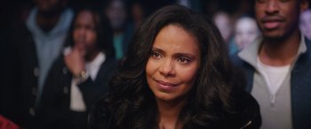 Movie still from “On the Come Up” (2022), directed by Sanaa Lathan – A person with long black hair; Close Up shot, Over the shoulder angle