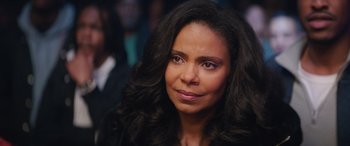 Movie still from “On the Come Up” (2022), directed by Sanaa Lathan – A woman that is looking into the camera; Close Up shot, Over the shoulder angle