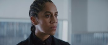 Movie still from “One Ranger” (2023), directed by Jesse V. Johnson – A person wearing a black shirt; Close Up shot, Over the shoulder angle