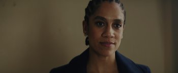 Movie still from “One Ranger” (2023), directed by Jesse V. Johnson – A person wearing a jacket; Close Up shot, Low angle