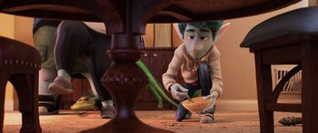 Movie still from “Onward” (2020), directed by Dan Scanlon – An image of an animated character under a table; Medium shot, High angle