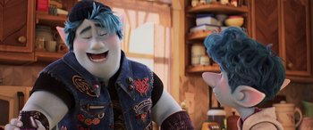 Movie still from “Onward” (2020), directed by Dan Scanlon – A man with blue hair and a blue vest is laughing; Medium shot, Over the shoulder angle