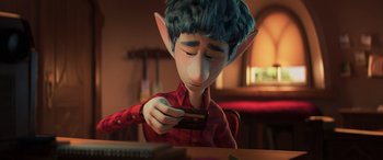 Movie still from “Onward” (2020), directed by Dan Scanlon – An animated character is holding a credit card; Close Up shot, Over the shoulder angle