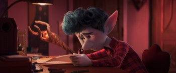 Movie still from “Onward” (2020), directed by Dan Scanlon – An animated character writing on a piece of paper; Medium shot, Over the shoulder angle