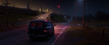 Movie still from “Onward” (2020), directed by Dan Scanlon – A car driving down a street at night; Extreme Wide shot, High angle