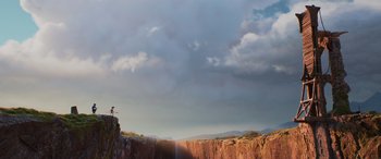 Movie still from “Onward” (2020), directed by Dan Scanlon – A person standing on a cliff looking at the sky; Extreme Wide shot, Low angle
