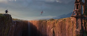 Movie still from “Onward” (2020), directed by Dan Scanlon – A man flying through the air while holding a kite; Extreme Wide shot, Low angle