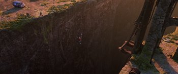 Movie still from “Onward” (2020), directed by Dan Scanlon – A man is jumping off a cliff into the water; Extreme Wide shot, Overhead angle