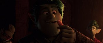 Movie still from “Onward” (2020), directed by Dan Scanlon – An image of an animated character eating a piece of food; Close Up shot, High angle